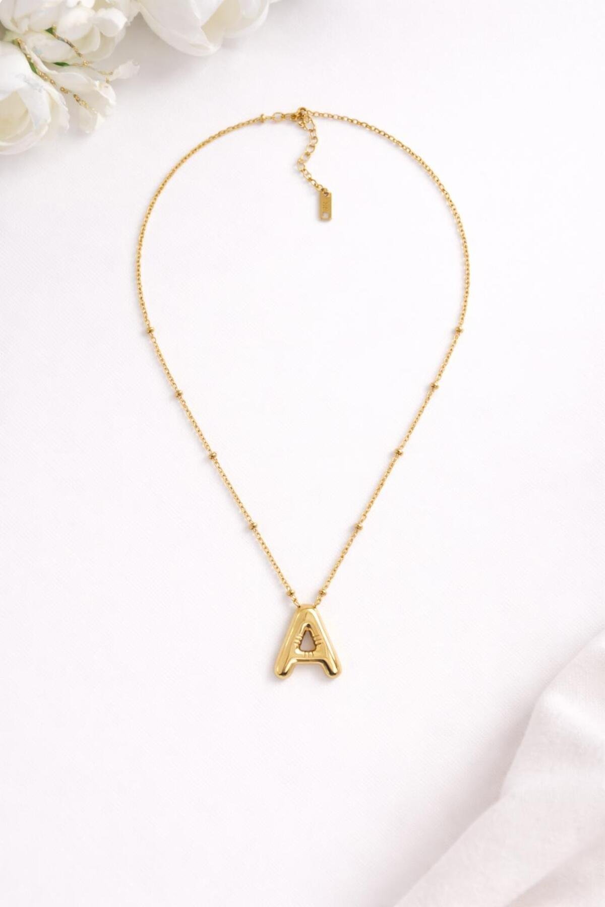 A HARFLİ BALON MODEL ÇELİK KOLYE