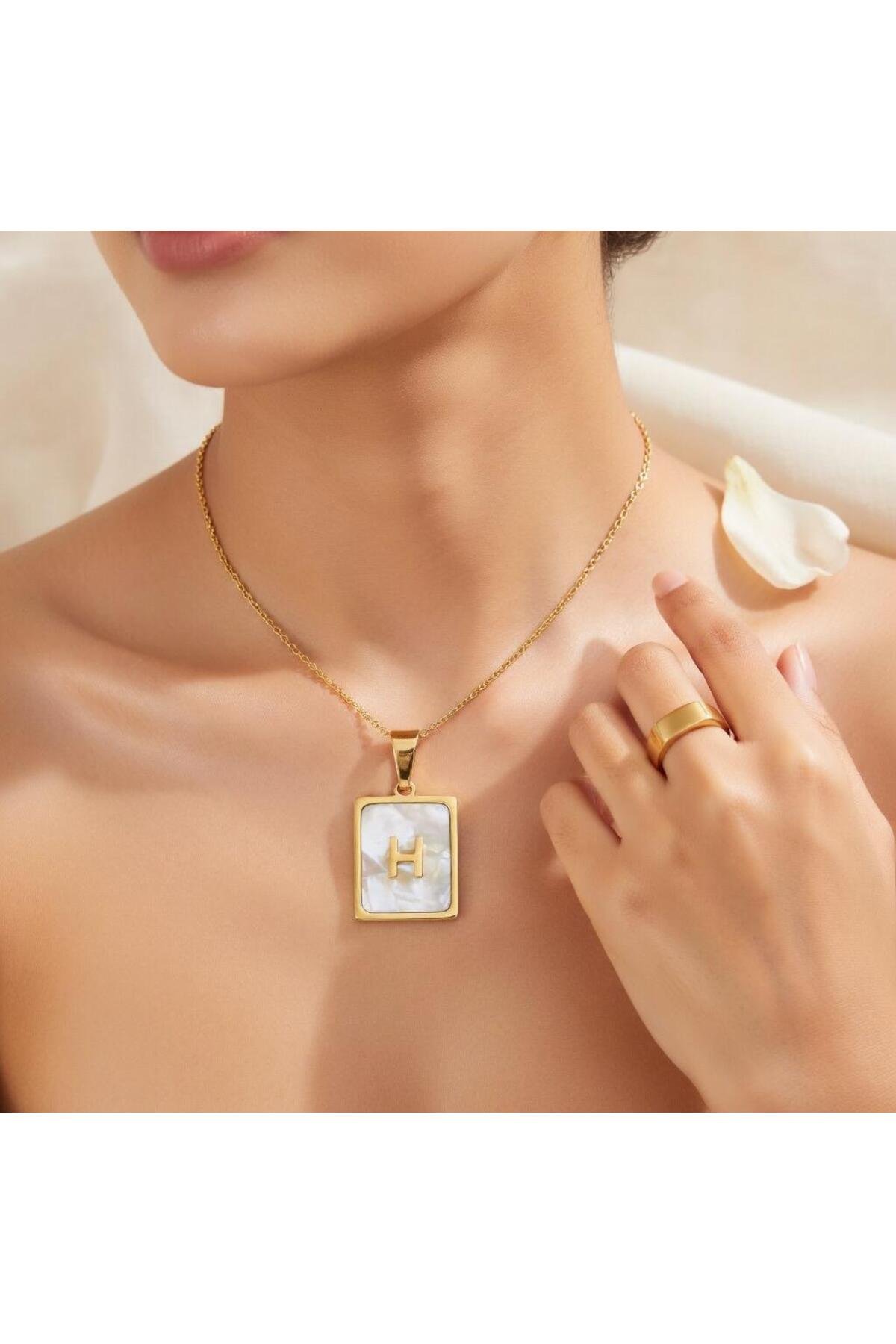 Çelik sedefli H harfli kolye