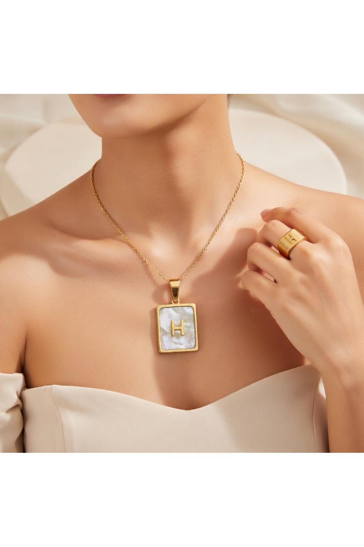 Çelik sedefli H harfli kolye