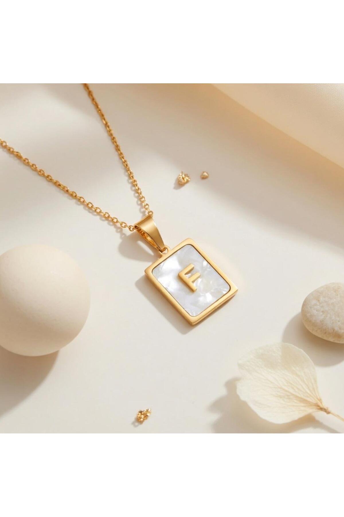 Çelik sedefli F harfli kolye