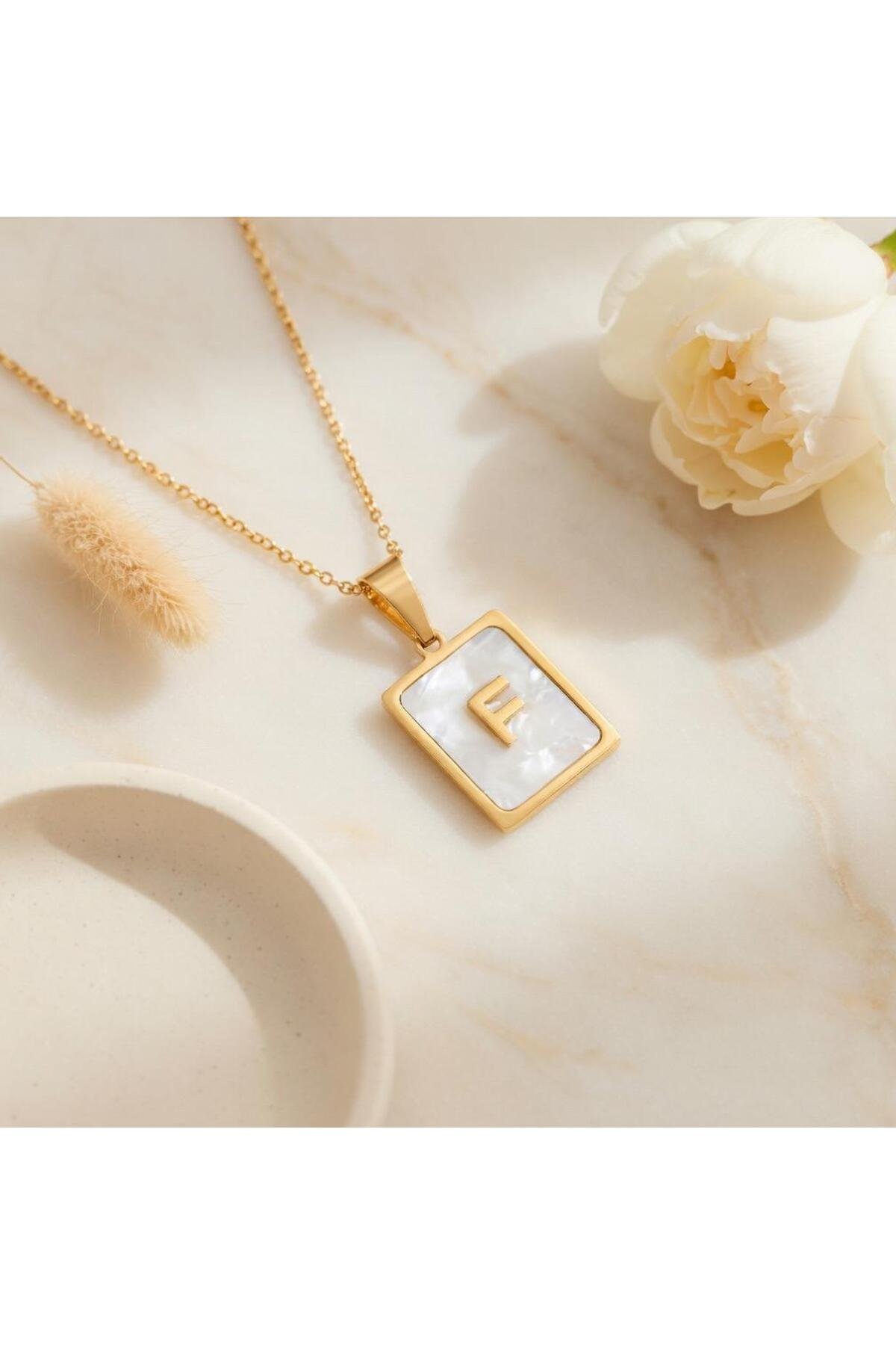 Çelik sedefli F harfli kolye