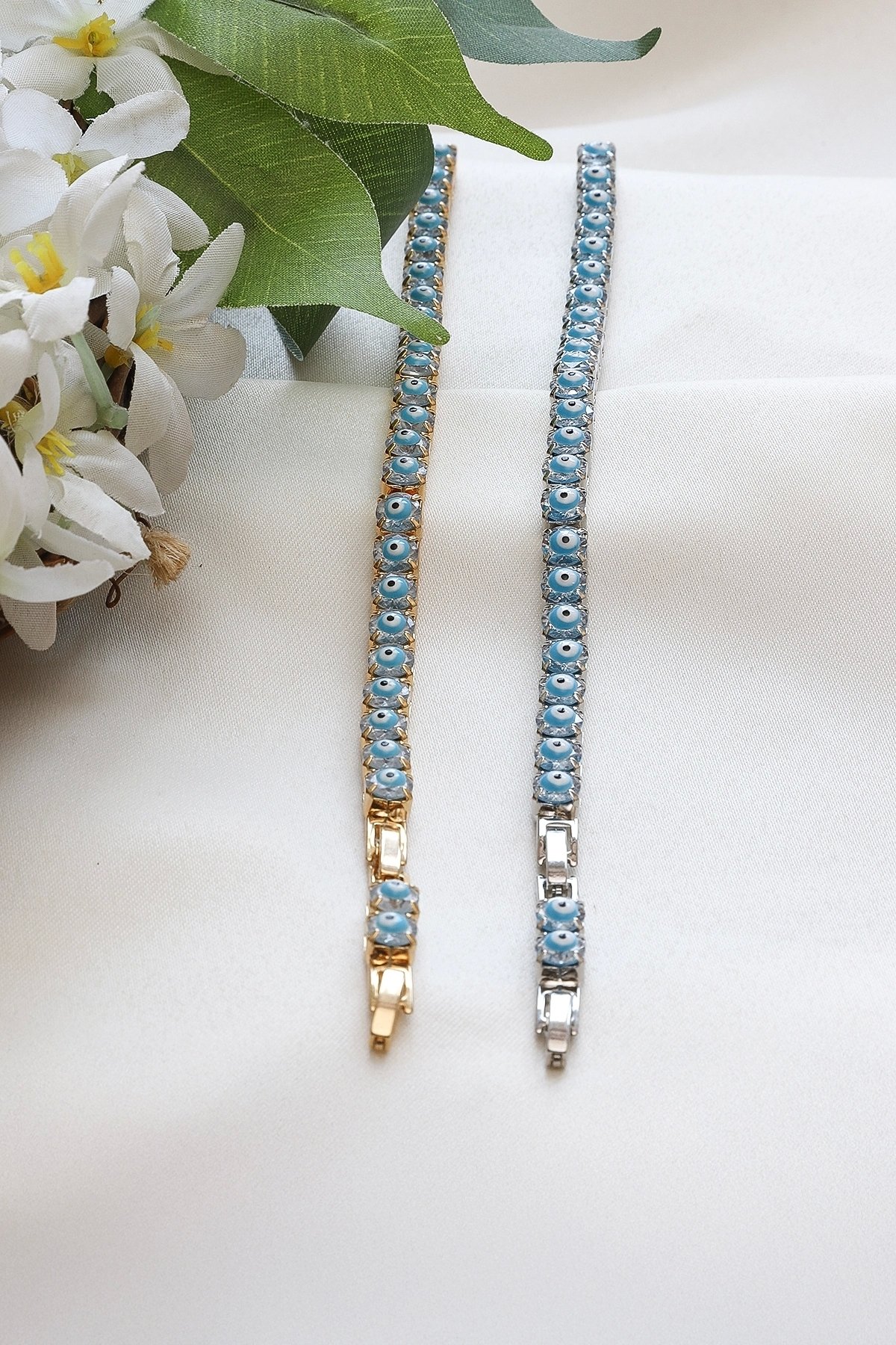 İRİ BOY ZİRKON TAŞ ÜZERİ MİNELİ NAZAR BONCUK GOLD BİLEKLİK