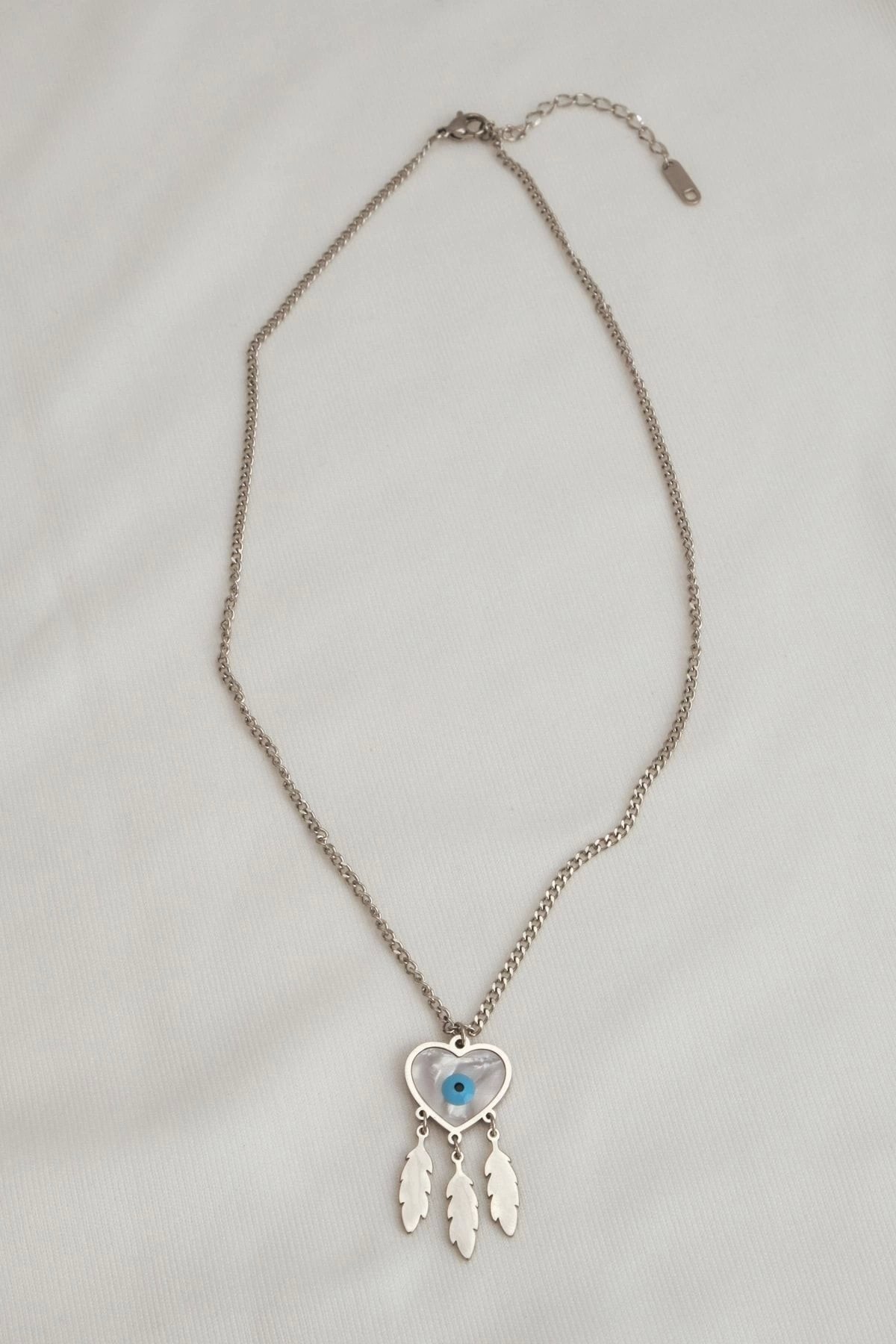 Nazar Göz Kalpli Gümüş Renk Çelik Kolye